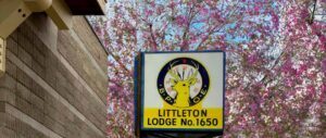 Littleton Elks Lodge #1650 Sign with Flowers Behind